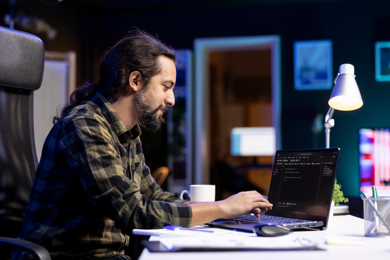 male-programmer-coding-laptop